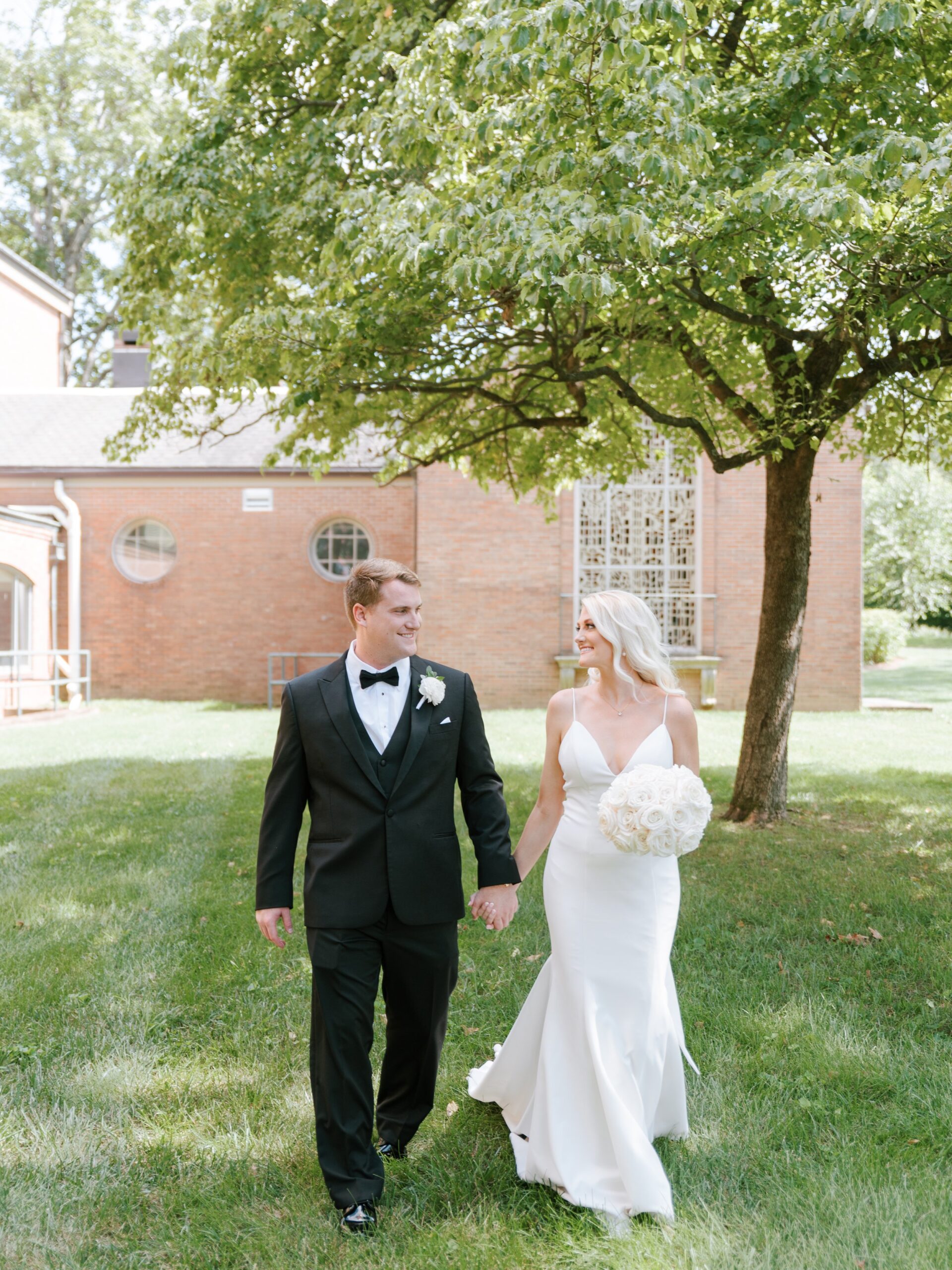 bride and groom walking photo