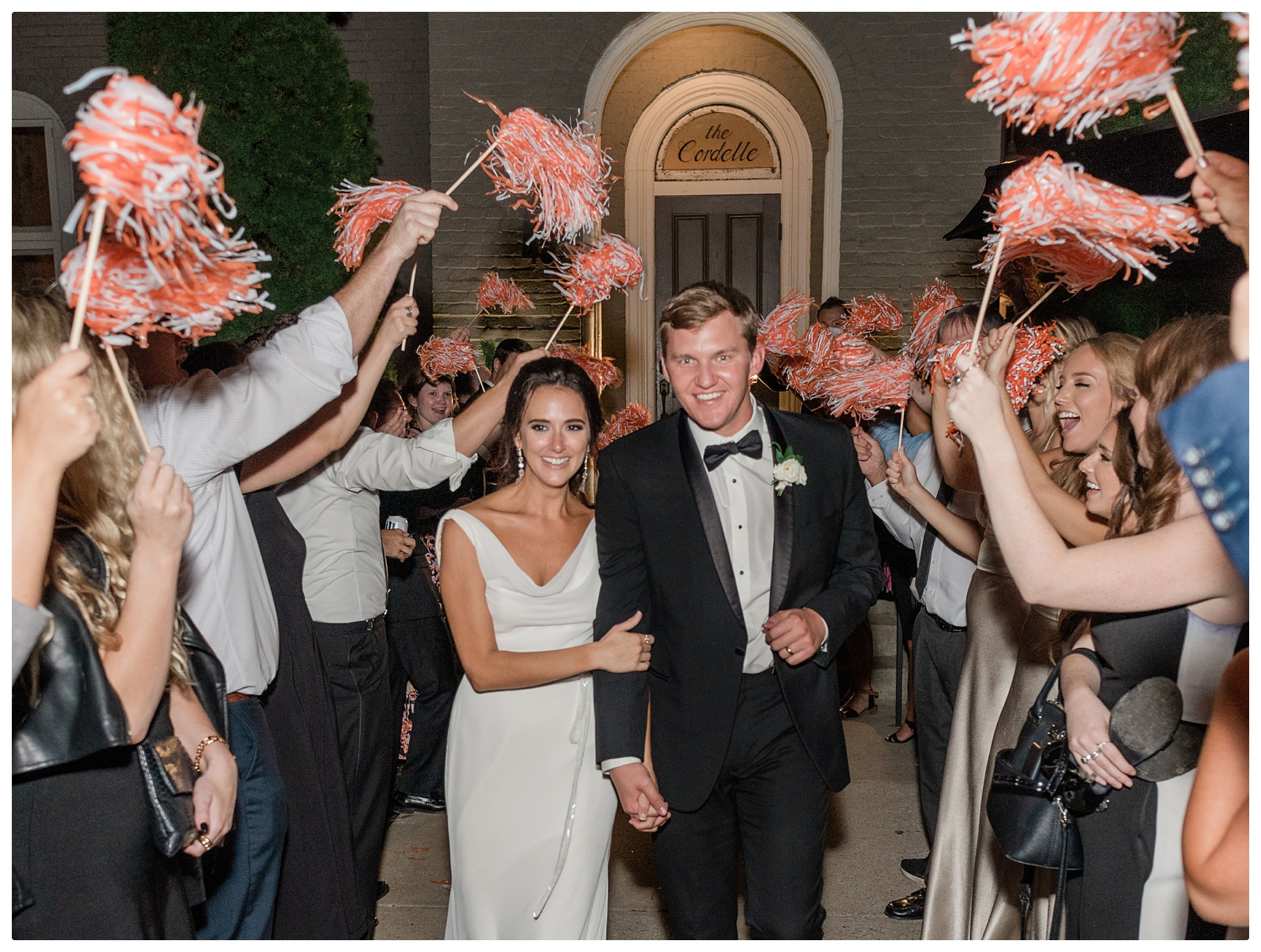 wedding reception exit with pom poms