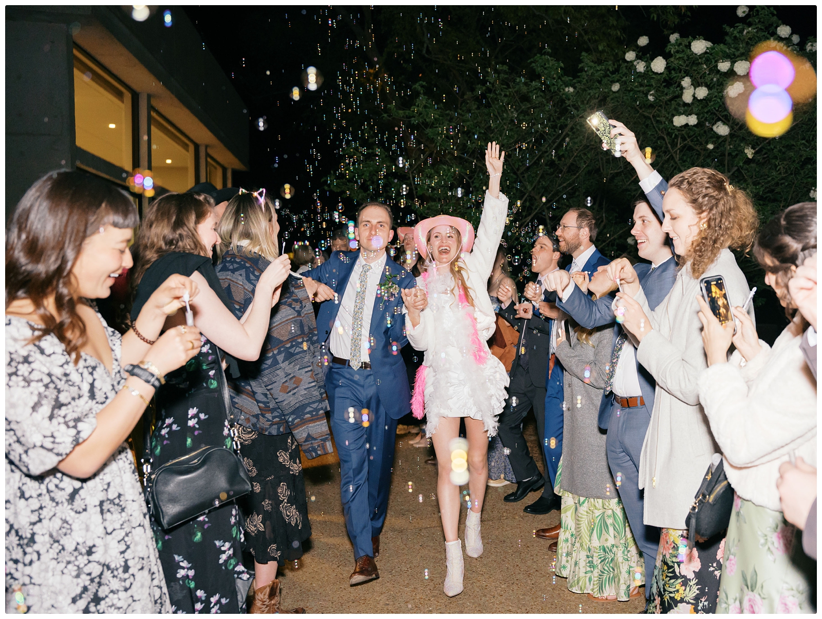 bride and groom bubble exit at their Cheekwood Estate and Gardens Wedding reception