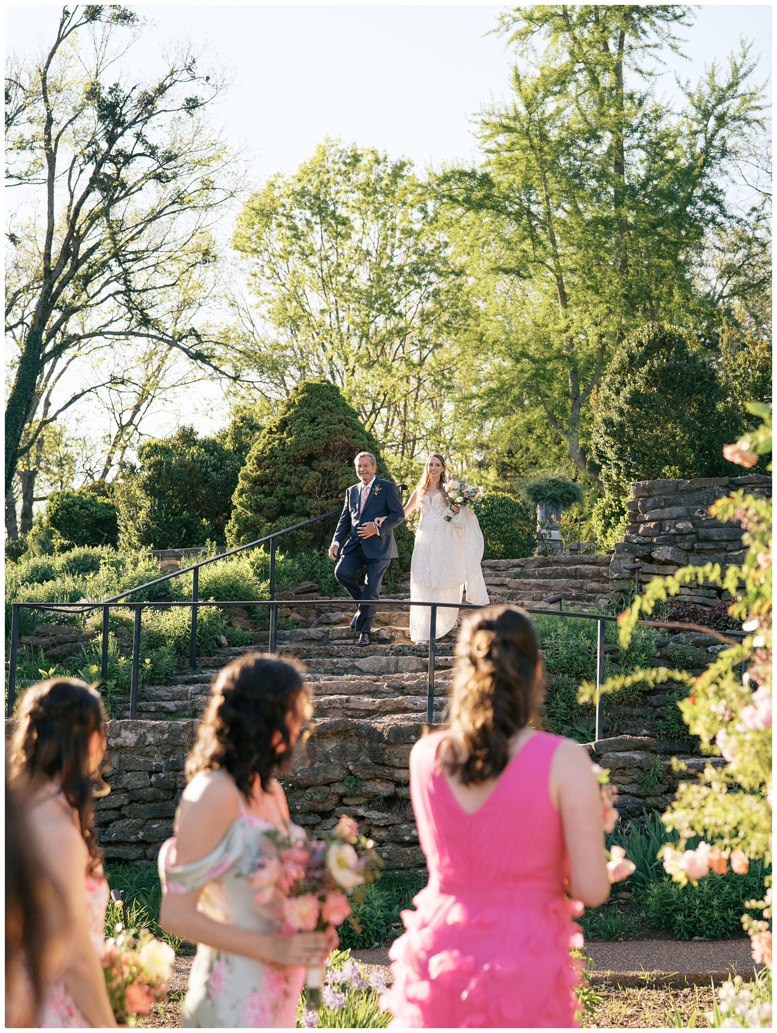 bride walking down the steps at Cheekwood Nashville wedding