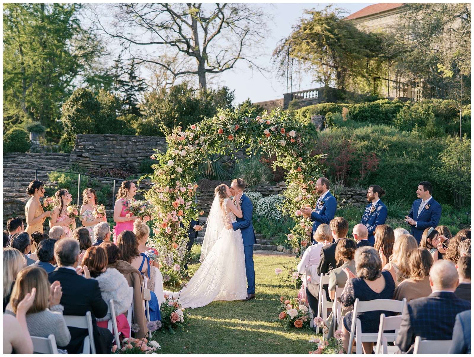 bride and groom first kiss at Cheekwood Nashville wedding ceremony