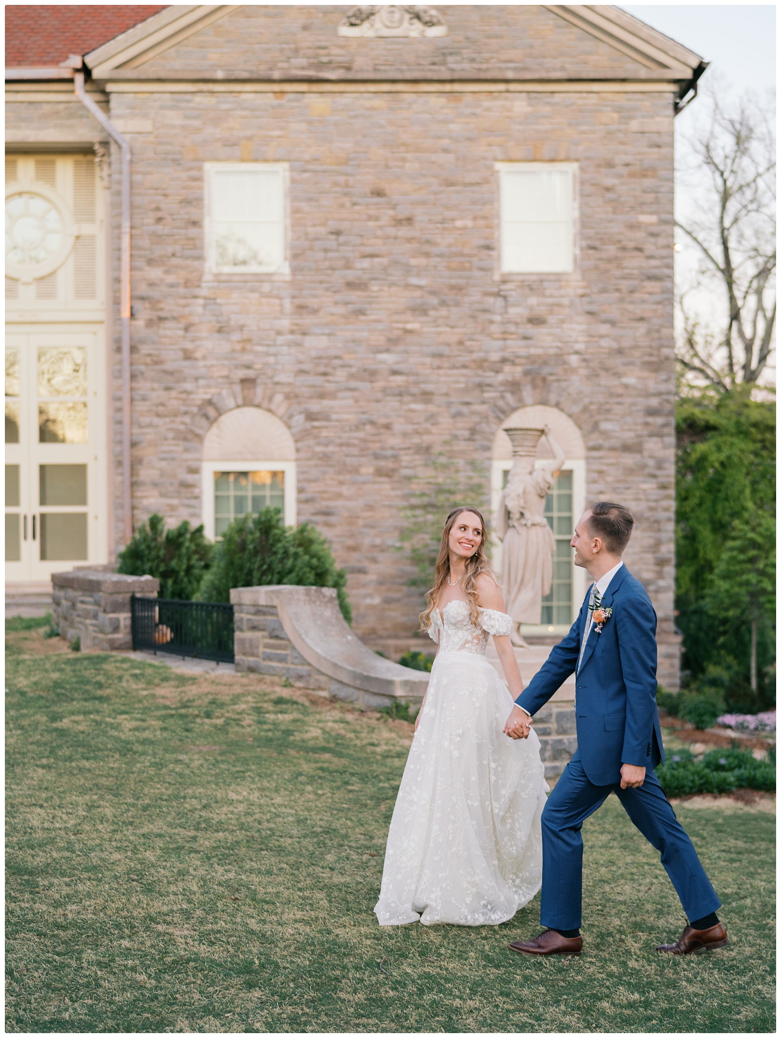 bride and groom walking photo at Cheekwood Nashville wedding