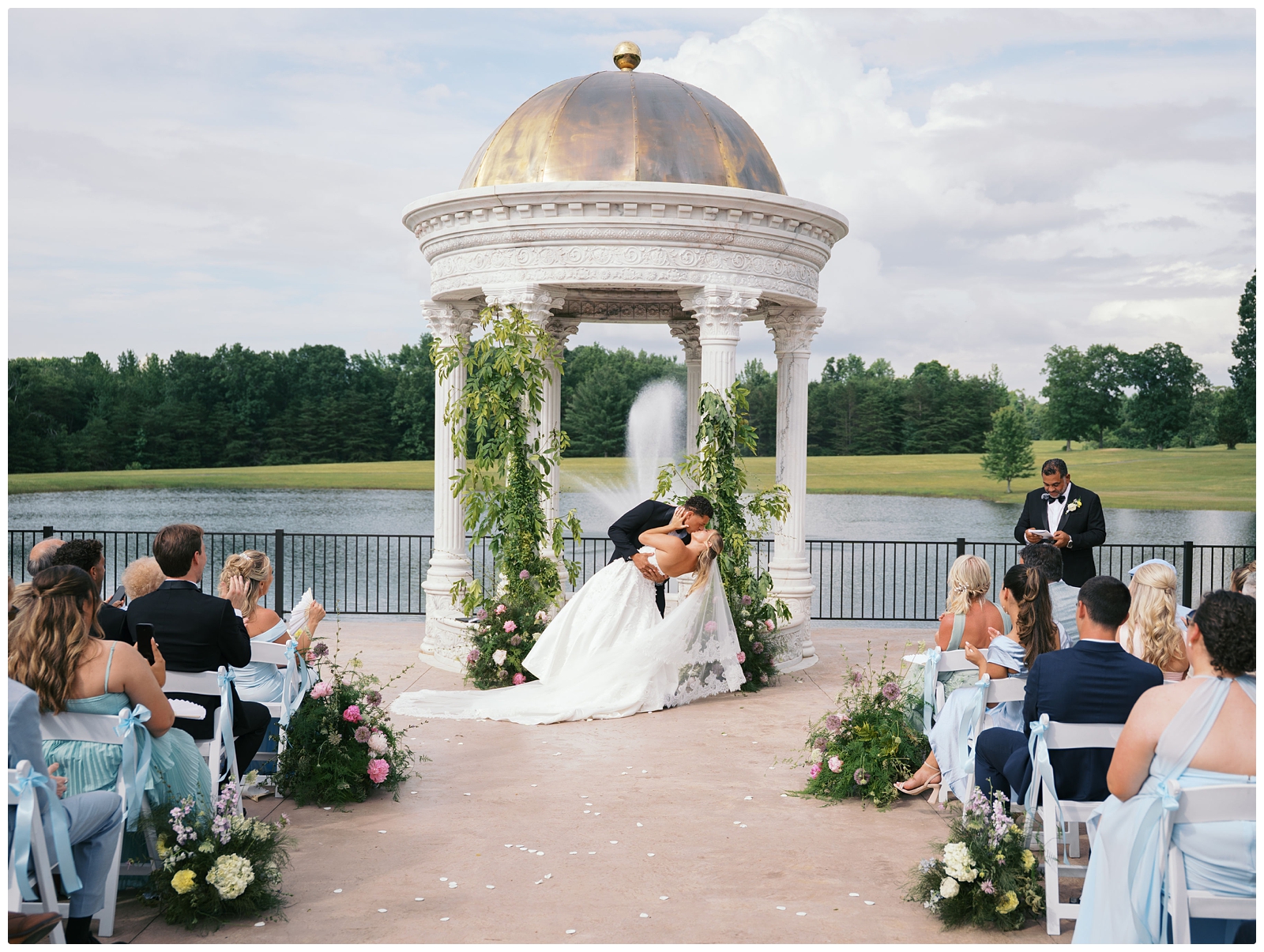 bride and groom first kiss at Blackberry ridge wedding ceremony