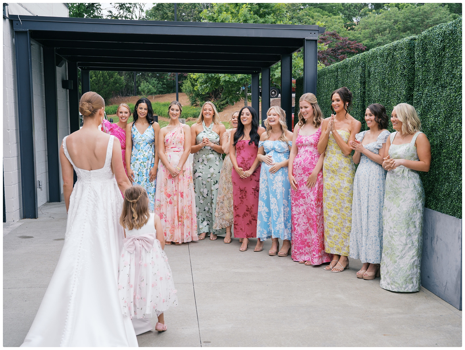 bride sharing a first look with bridesmaids at Saint Elle Nashville
