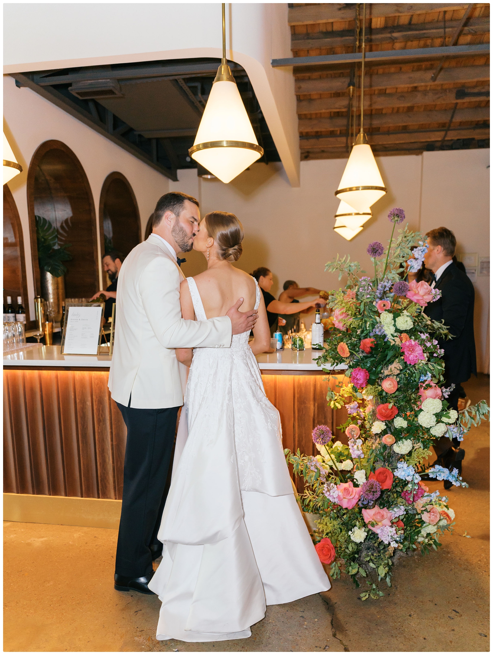 bride and groom kissing at Saint Elle Nashville wedding reception
