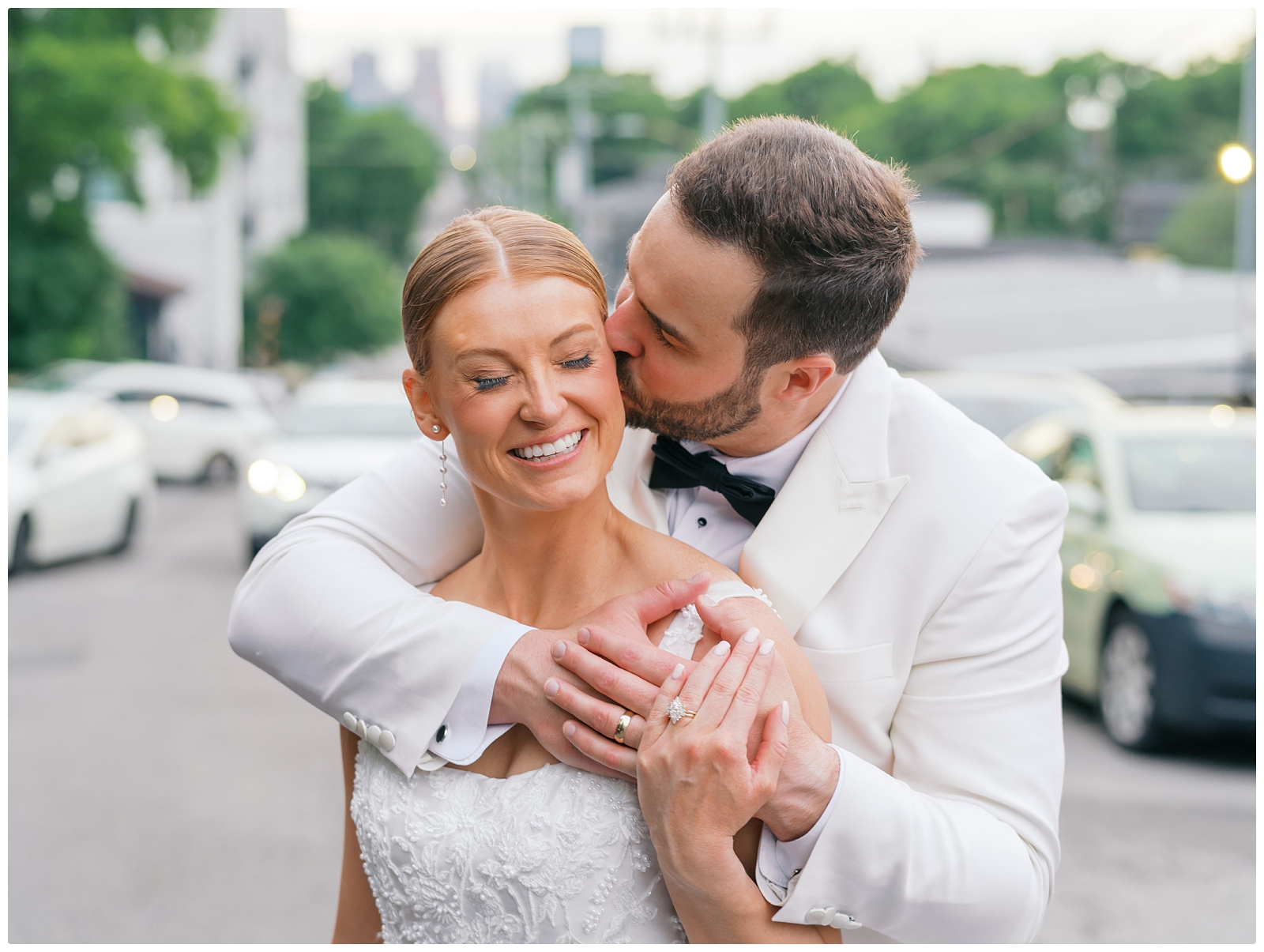 Saint Elle Nashville wedding photos of groom kissing brides cheek