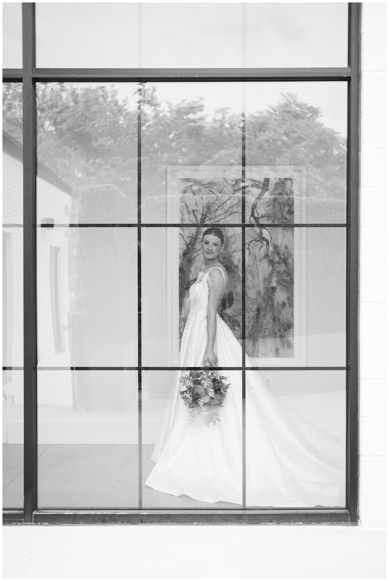 bride looking out the window photo at her Saint Elle Nashville wedding