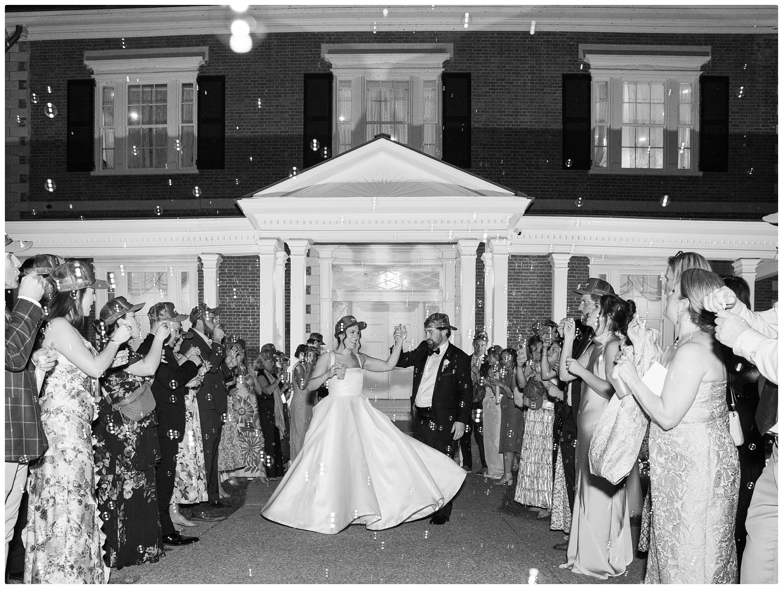 Ravenswood Mansion Wedding reception exit with bubbles